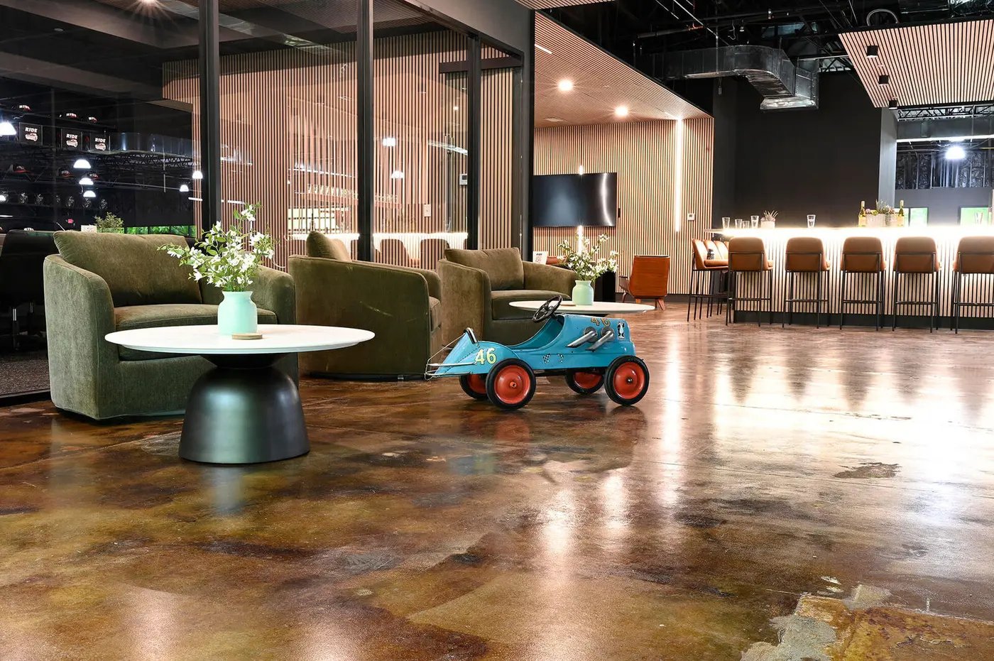 The lounge and bar beside the showroom floor at The Ride Lounge